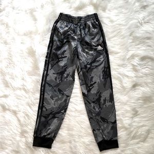 Boys Adidas athletic pants.  Front pockets and draw string waist.
